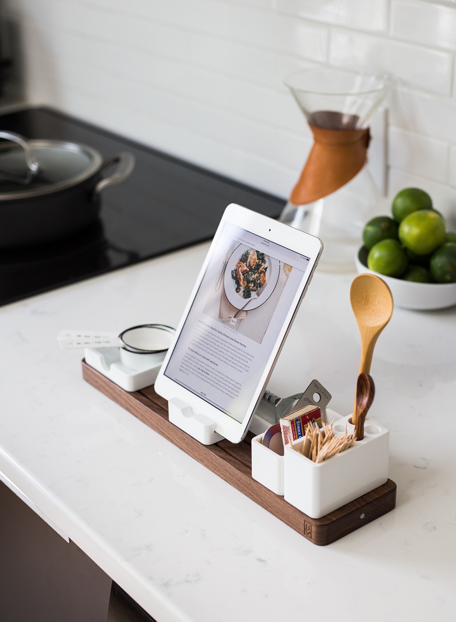 Modern kitchen setup with tablet showing meal planning interface